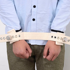 Both hands tie a belt approximately