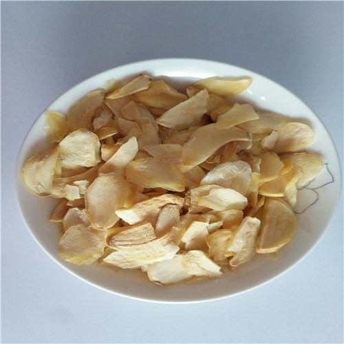 Dehydrated garlic slice for snack produce