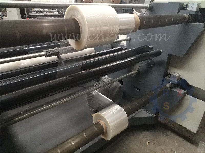 Breathable film slitting and rewinding machine with puncture roller