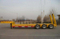 carro de acoplado plano inferior resistente de 30T 50T 80T con el alimentador de FOTON HOWO ISUZU