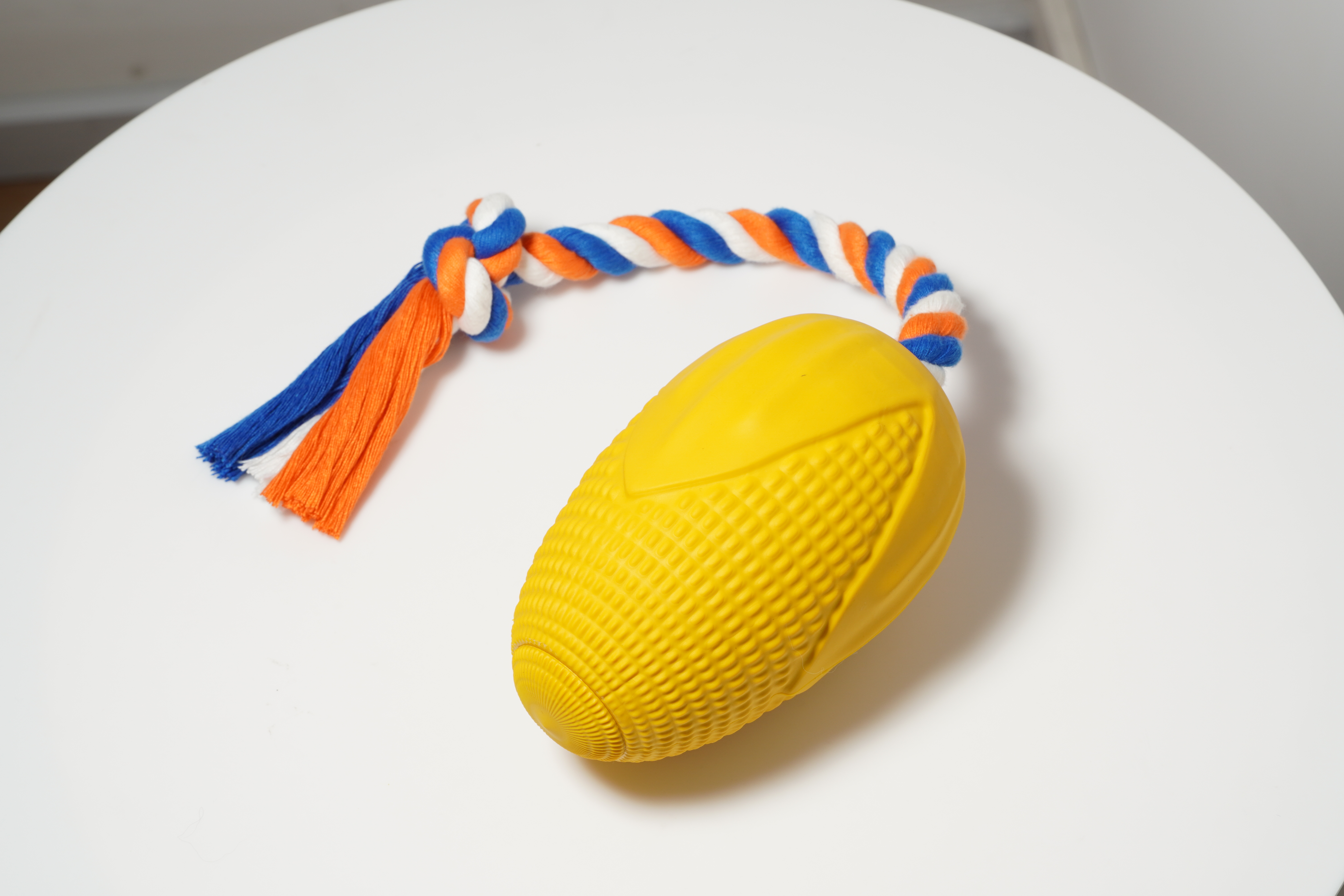 rubber corn with rope dog toy