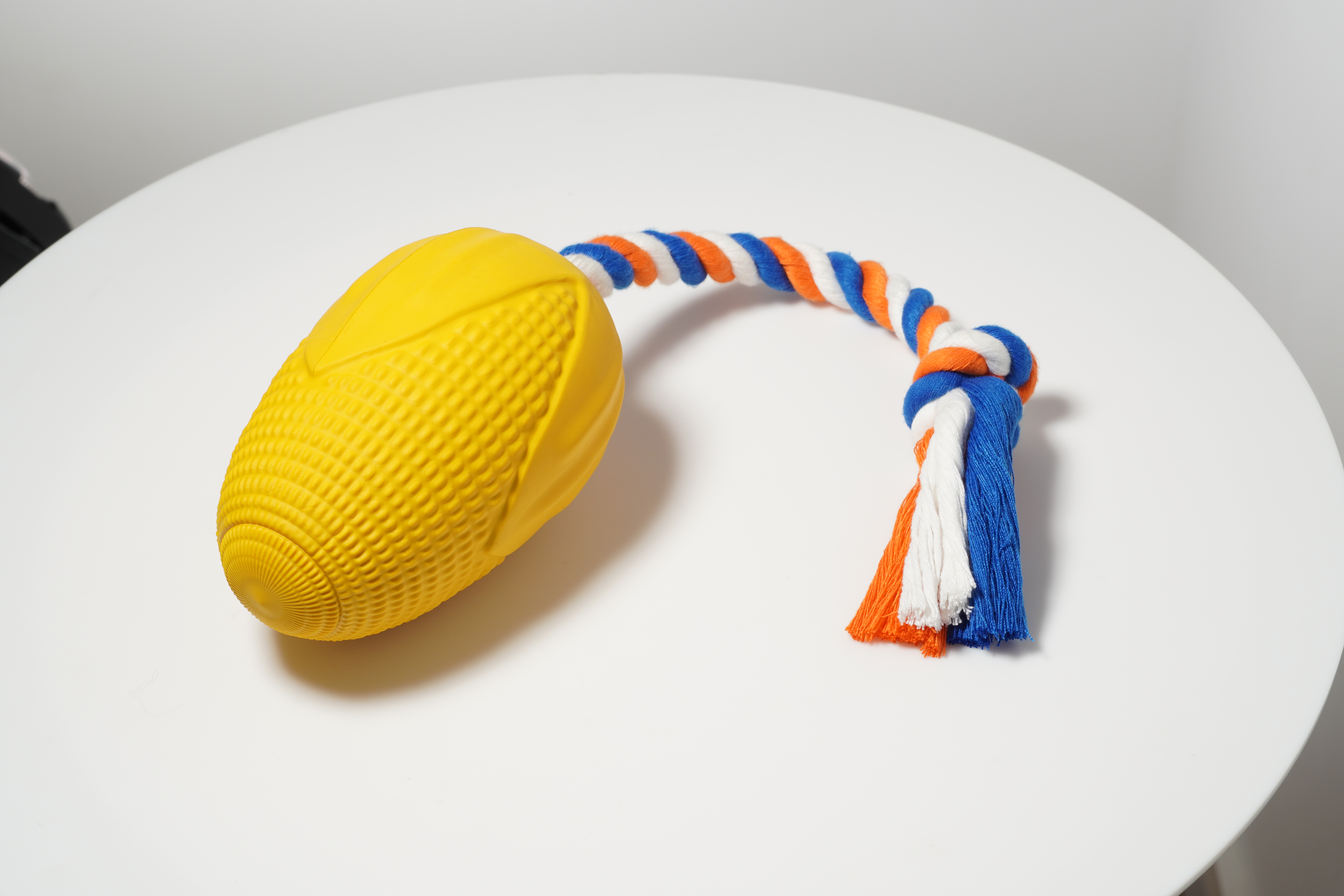 rubber corn with rope dog toy